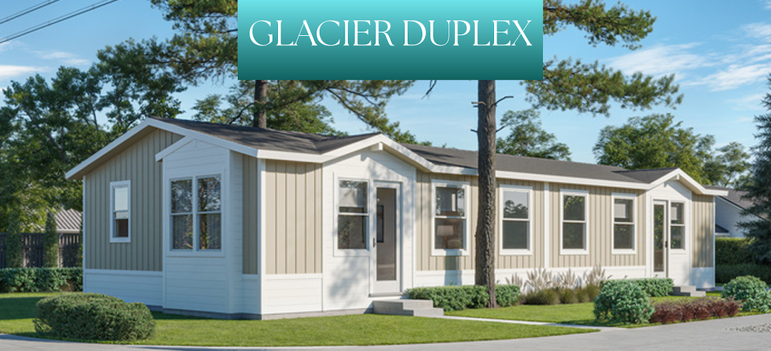 Perpetual Homes ADU: A manufactured Glacier Duplex home. Light tan and white exterior, green lawn, trees.
