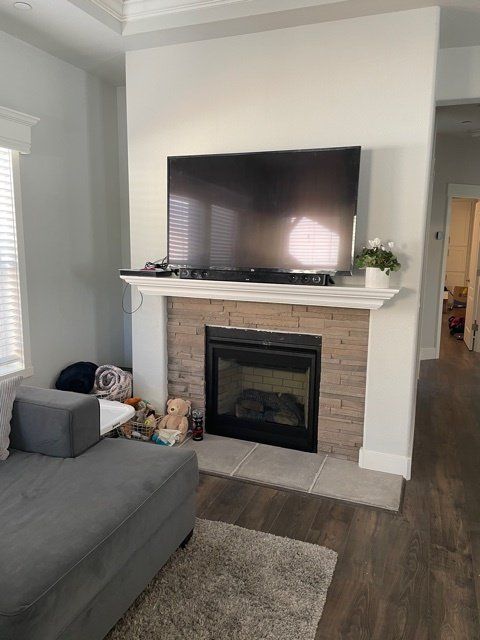 TV above Fireplace