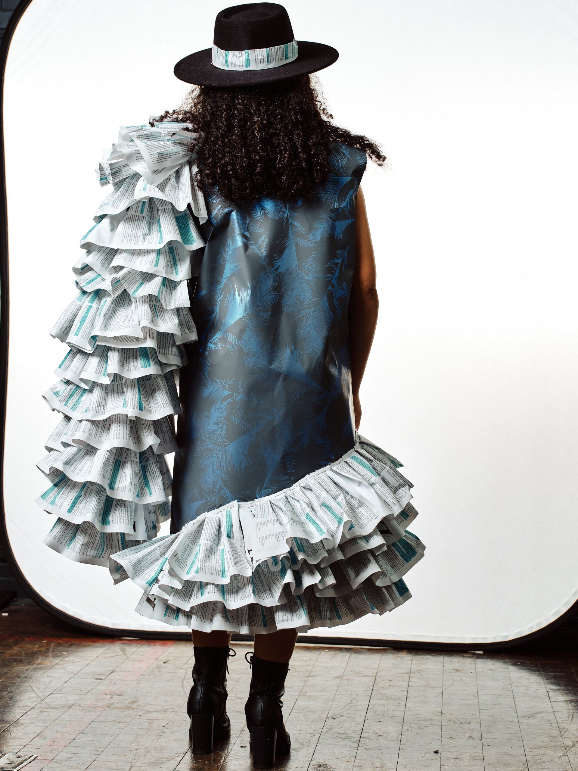 Model in hand-made garment at the 2022 Sustainable Fashion Show at New Design High School. Photo by Christian Rodriguez