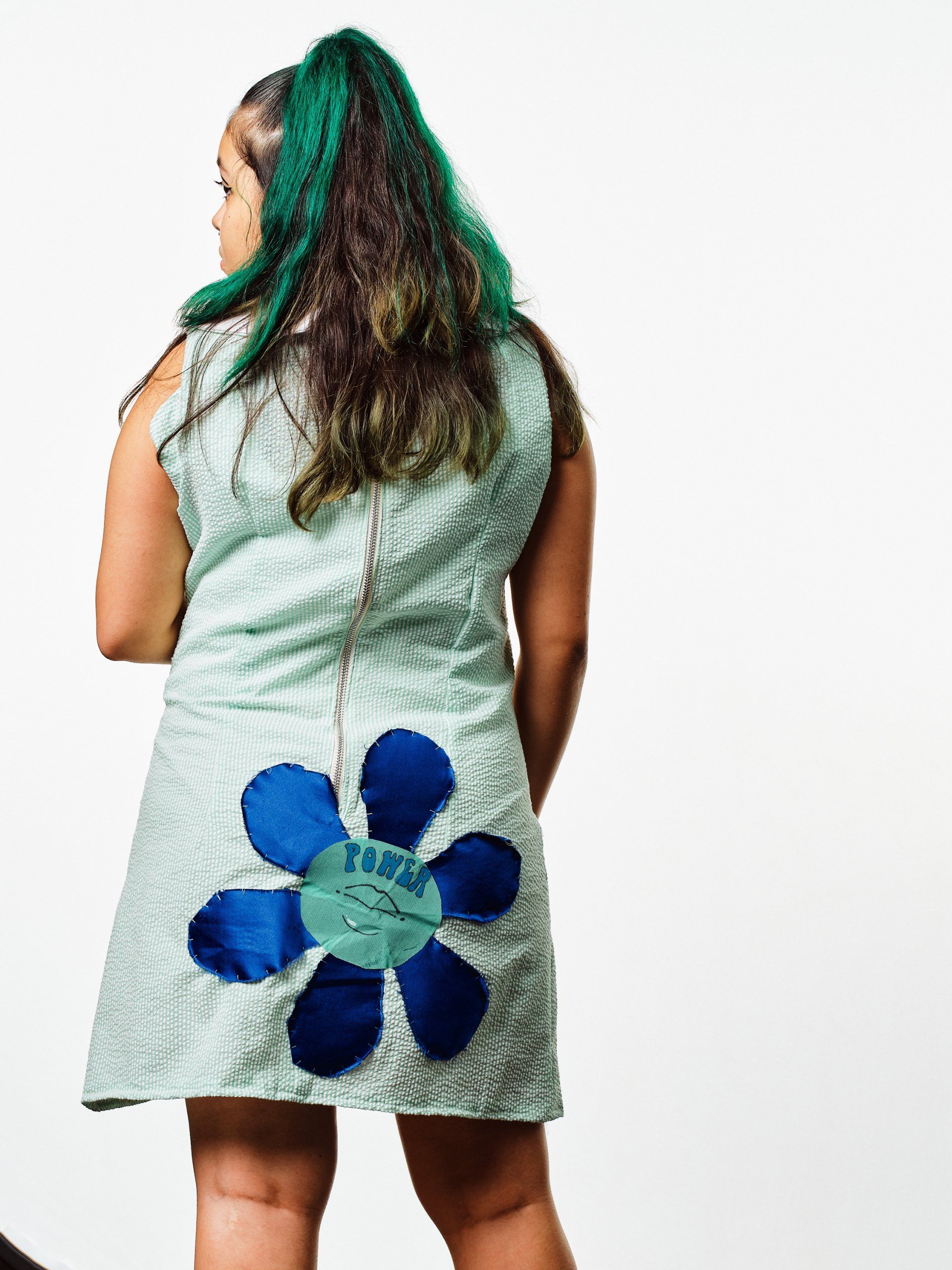 Model in hand-made garment at the 2022 Sustainable Fashion Show at New Design High School. Photo by Christian Rodriguez