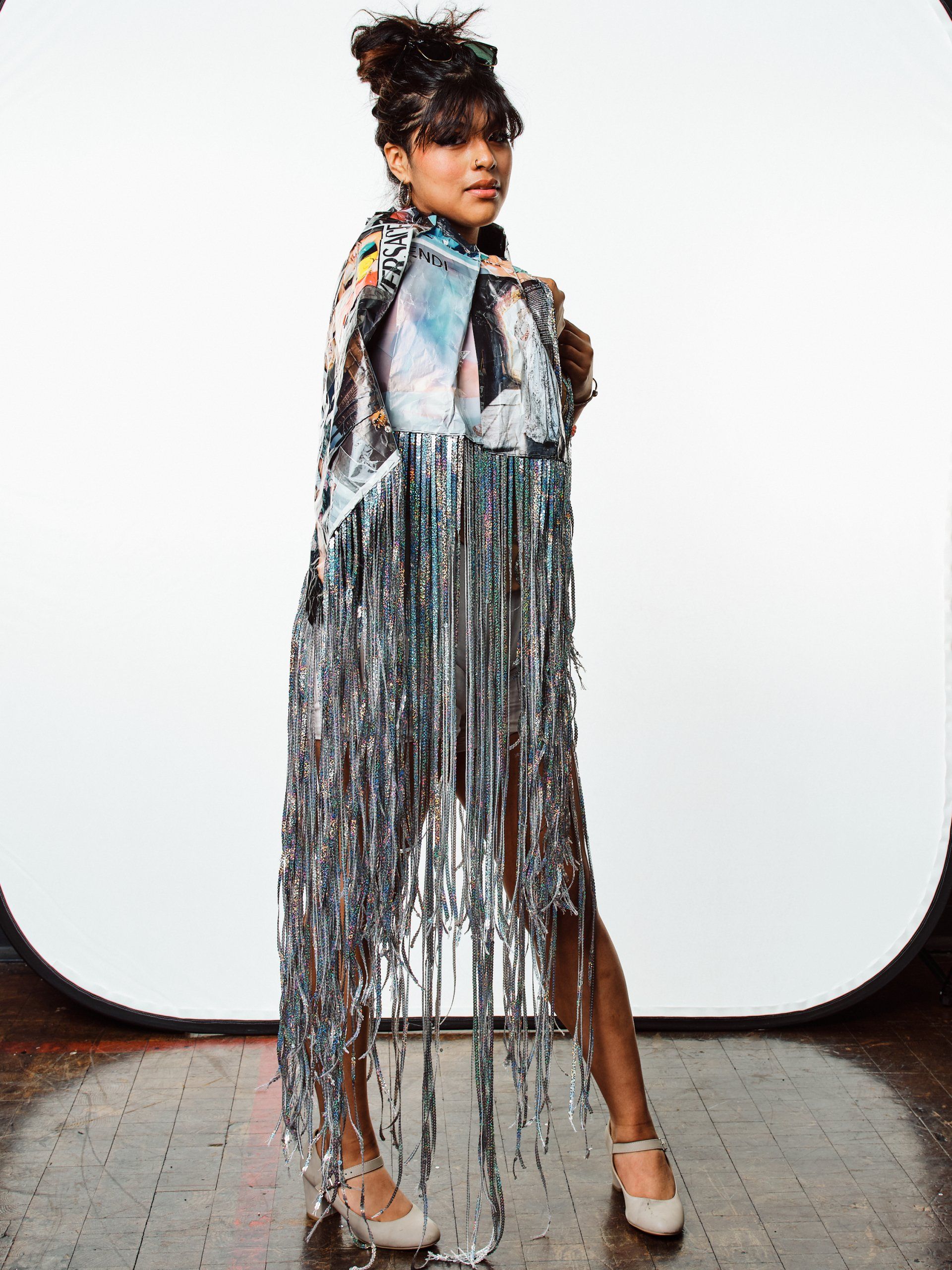 Model in hand-made garment at the 2022 Sustainable Fashion Show at New Design High School. Photo by Christian Rodriguez
