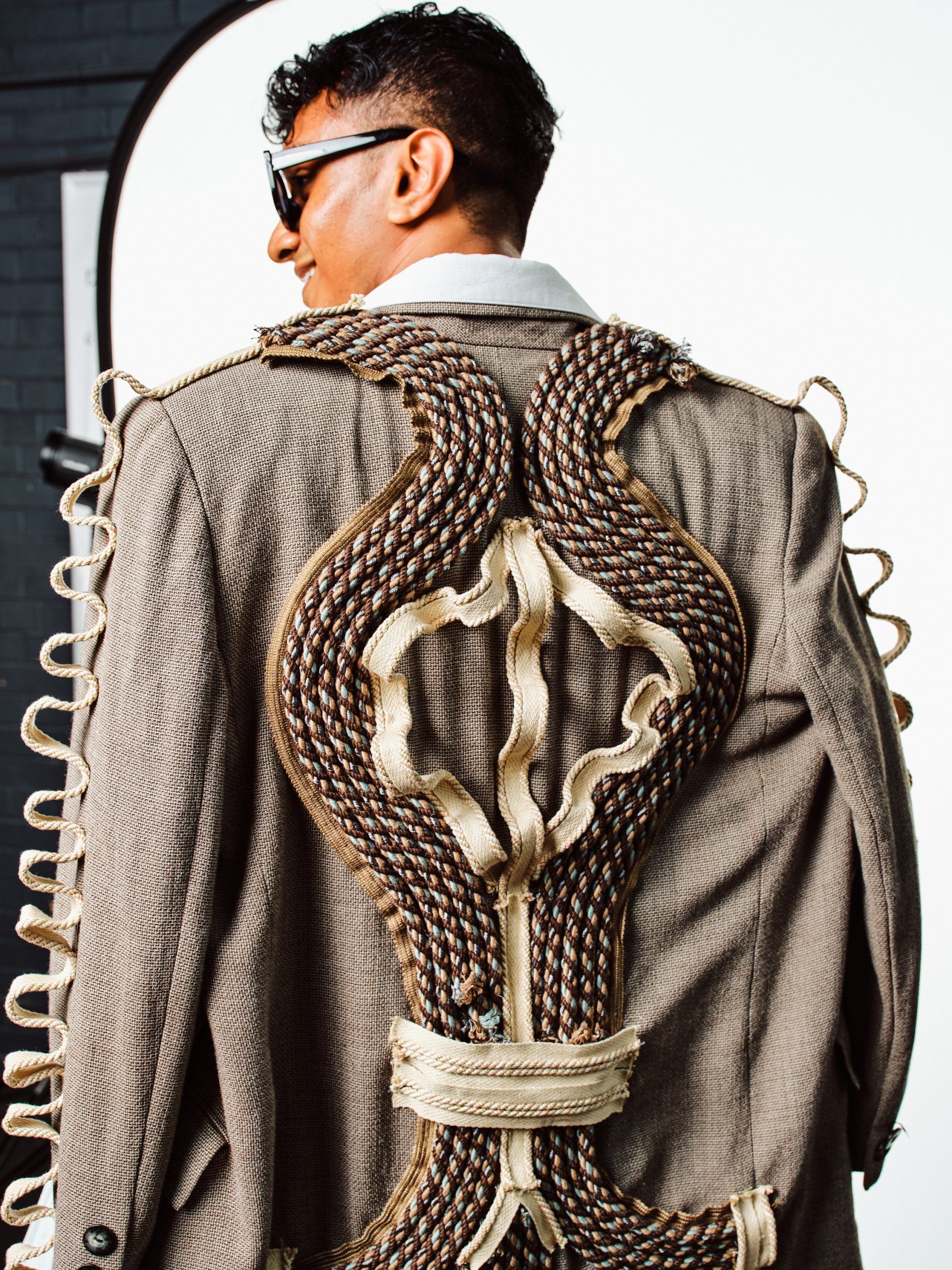 Model in hand-made garment at the 2022 Sustainable Fashion Show at New Design High School. Photo by Christian Rodriguez