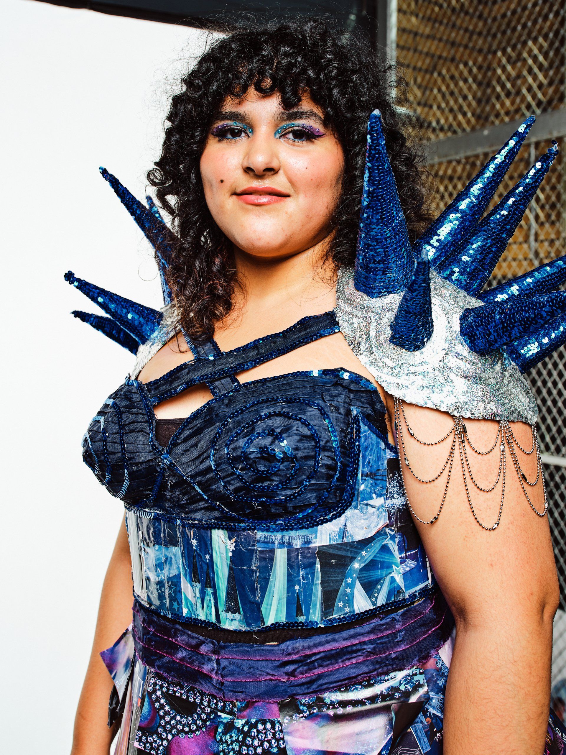 Model in hand-made garment at the 2022 Sustainable Fashion Show at New Design High School. Photo by Christian Rodriguez