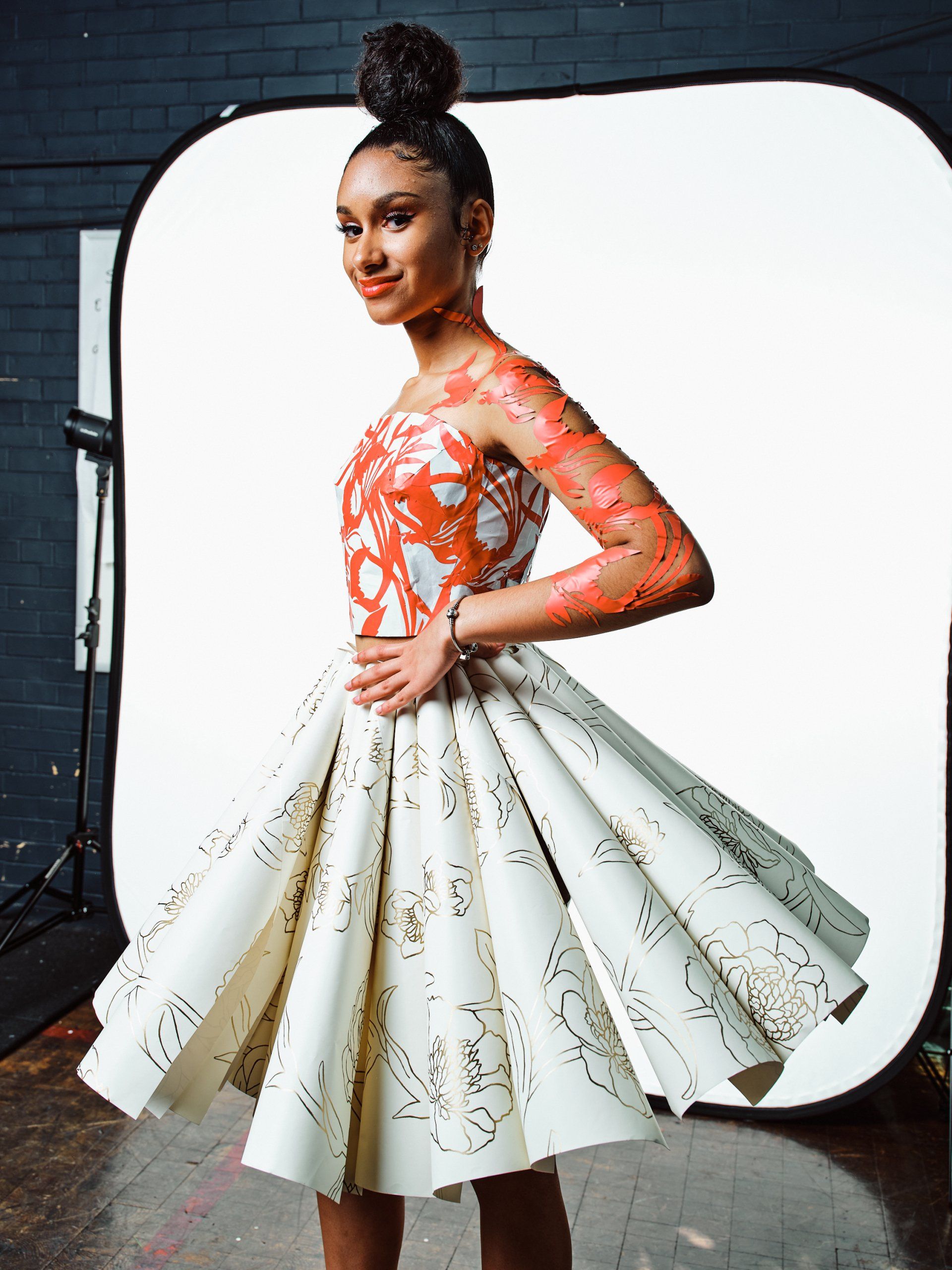Model in hand-made garment at the 2022 Sustainable Fashion Show at New Design High School. Photo by Christian Rodriguez