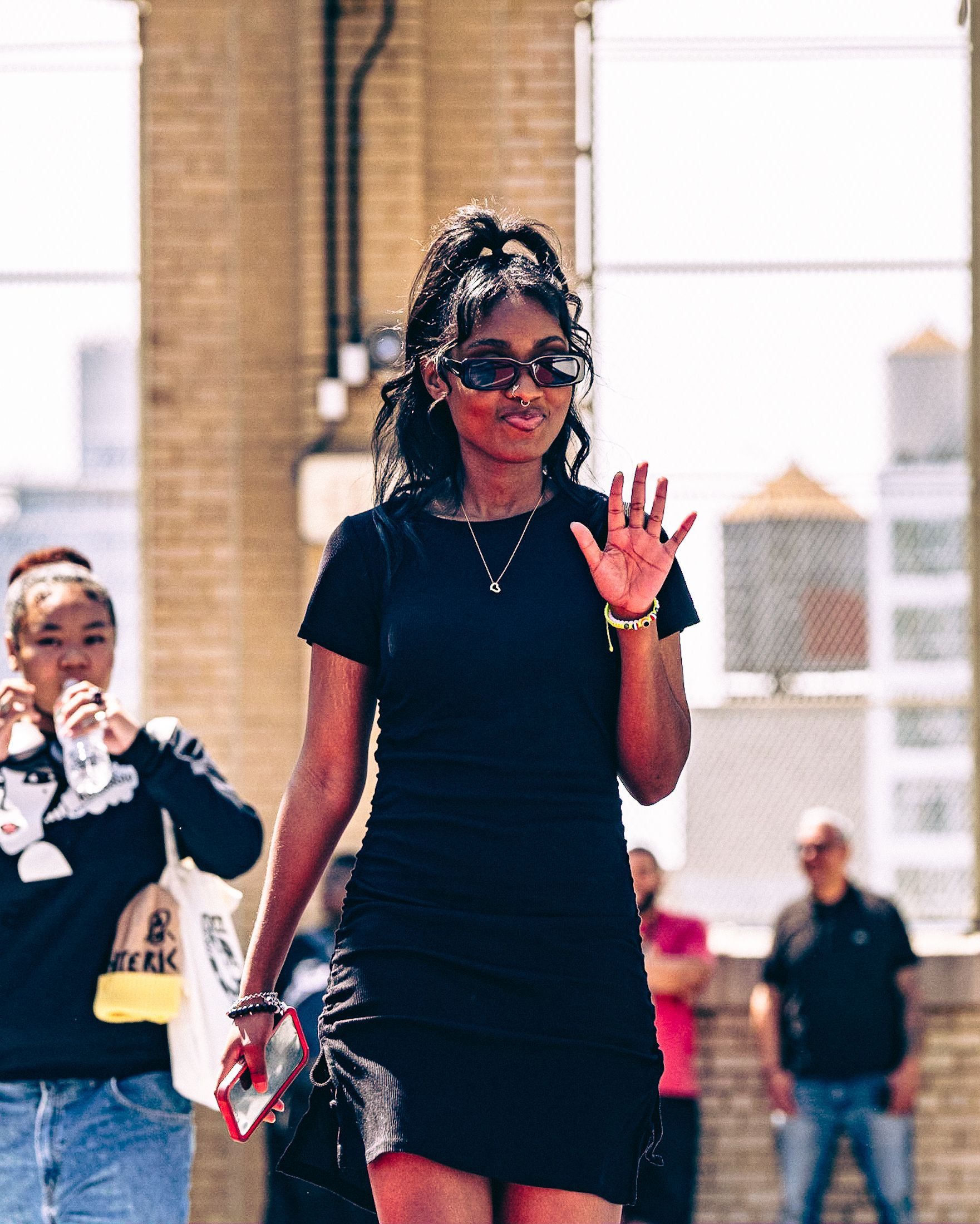 Model in hand-made garment at the 2023 Sustainable Fashion Show at New Design High School. Photo by Luis Suarez