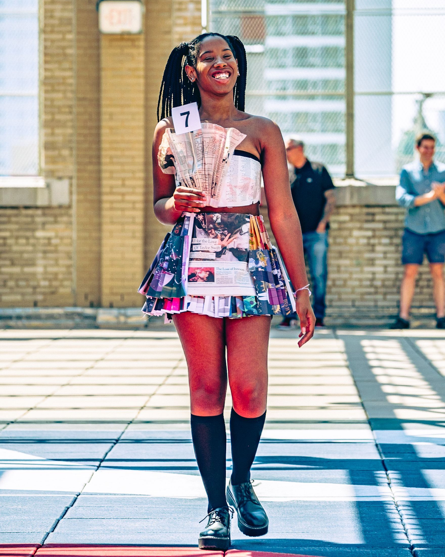 Model in hand-made garment at the 2023 Sustainable Fashion Show at New Design High School. Photo by Luis Suarez