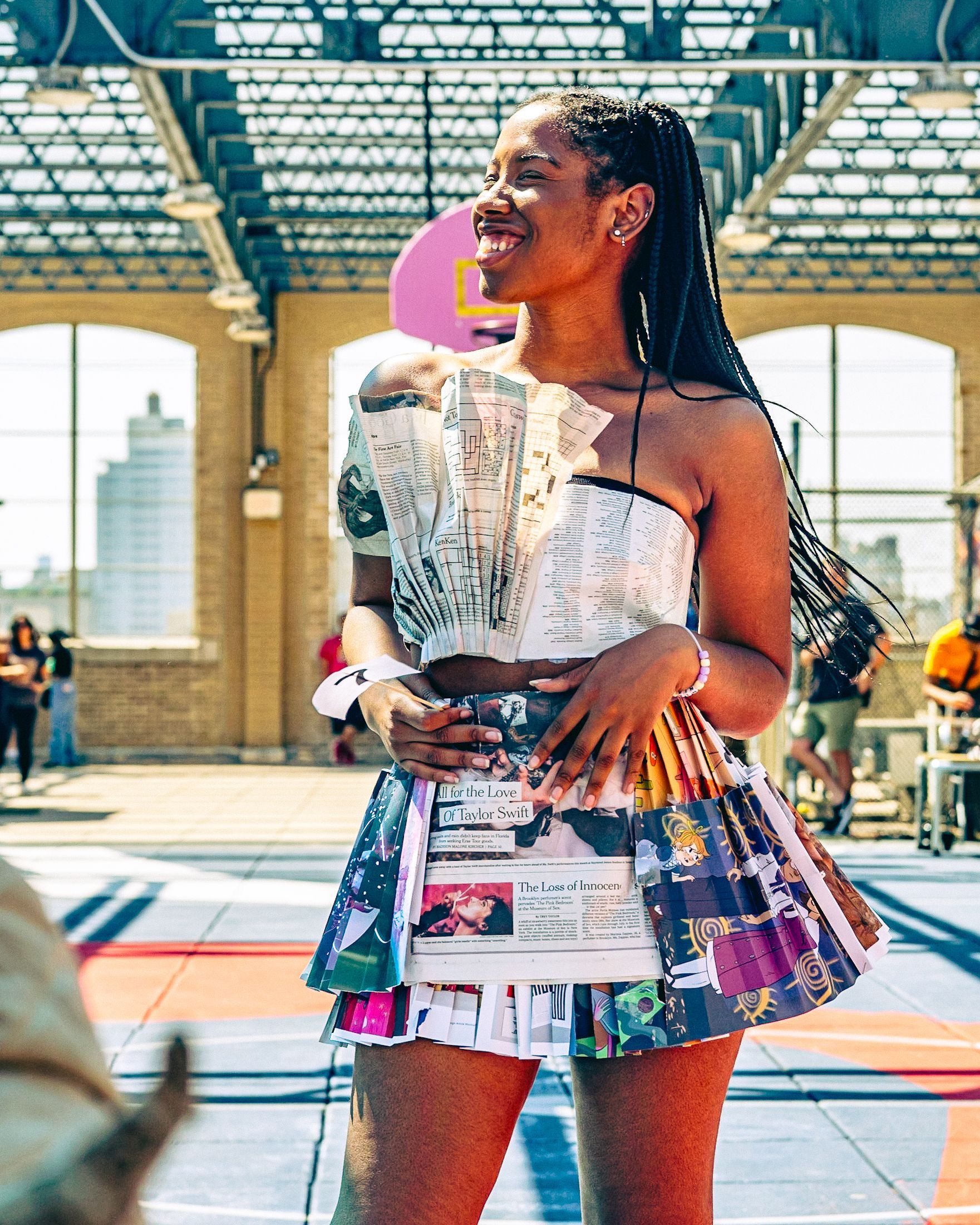 Model in hand-made garment at the 2023 Sustainable Fashion Show at New Design High School. Photo by Luis Suarez
