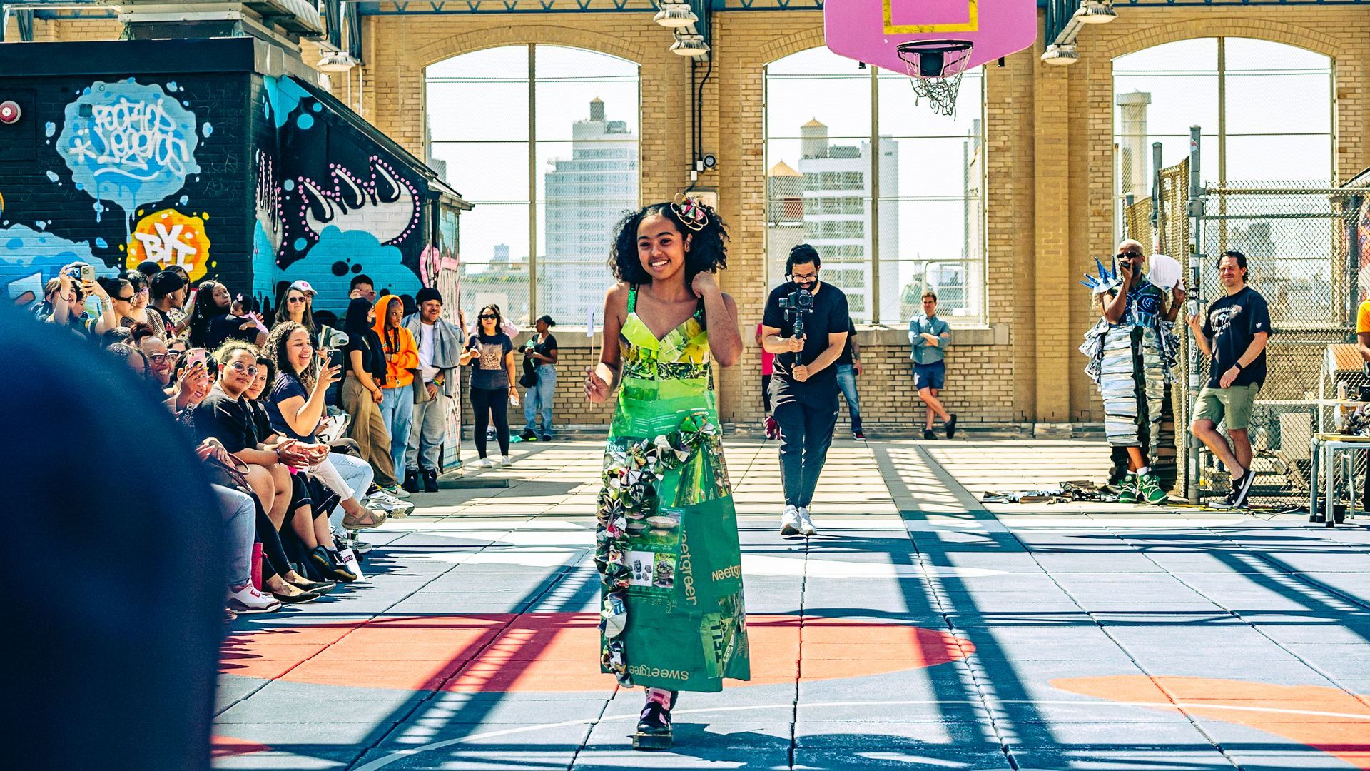 Model in hand-made garment at the 2023 Sustainable Fashion Show at New Design High School. Photo by Luis Suarez