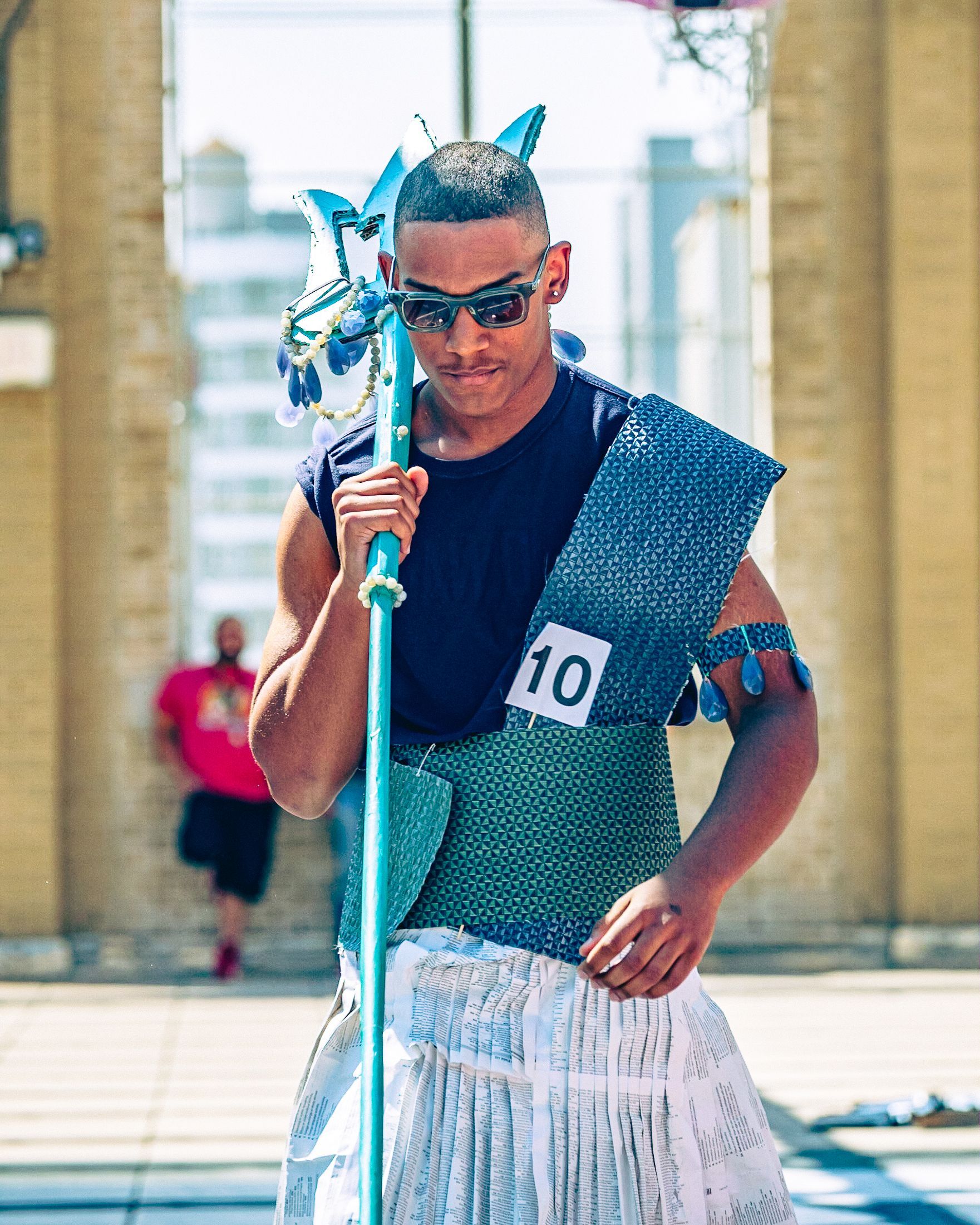 Model in hand-made garment at the 2023 Sustainable Fashion Show at New Design High School. Photo by Luis Suarez