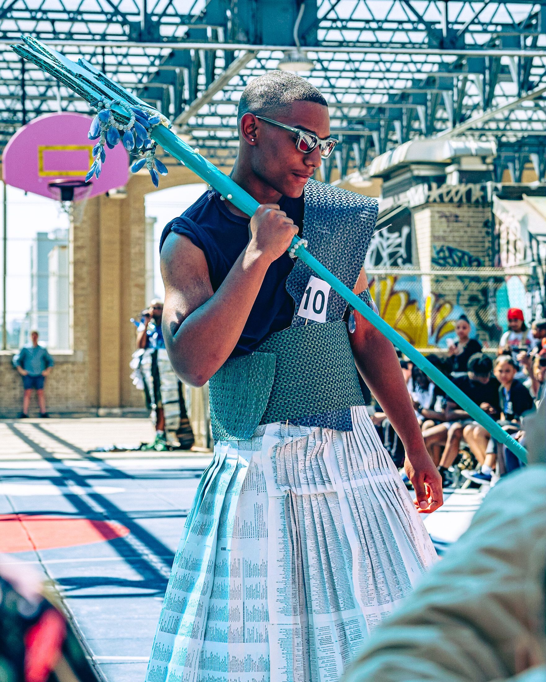 Model in hand-made garment at the 2023 Sustainable Fashion Show at New Design High School. Photo by Luis Suarez
