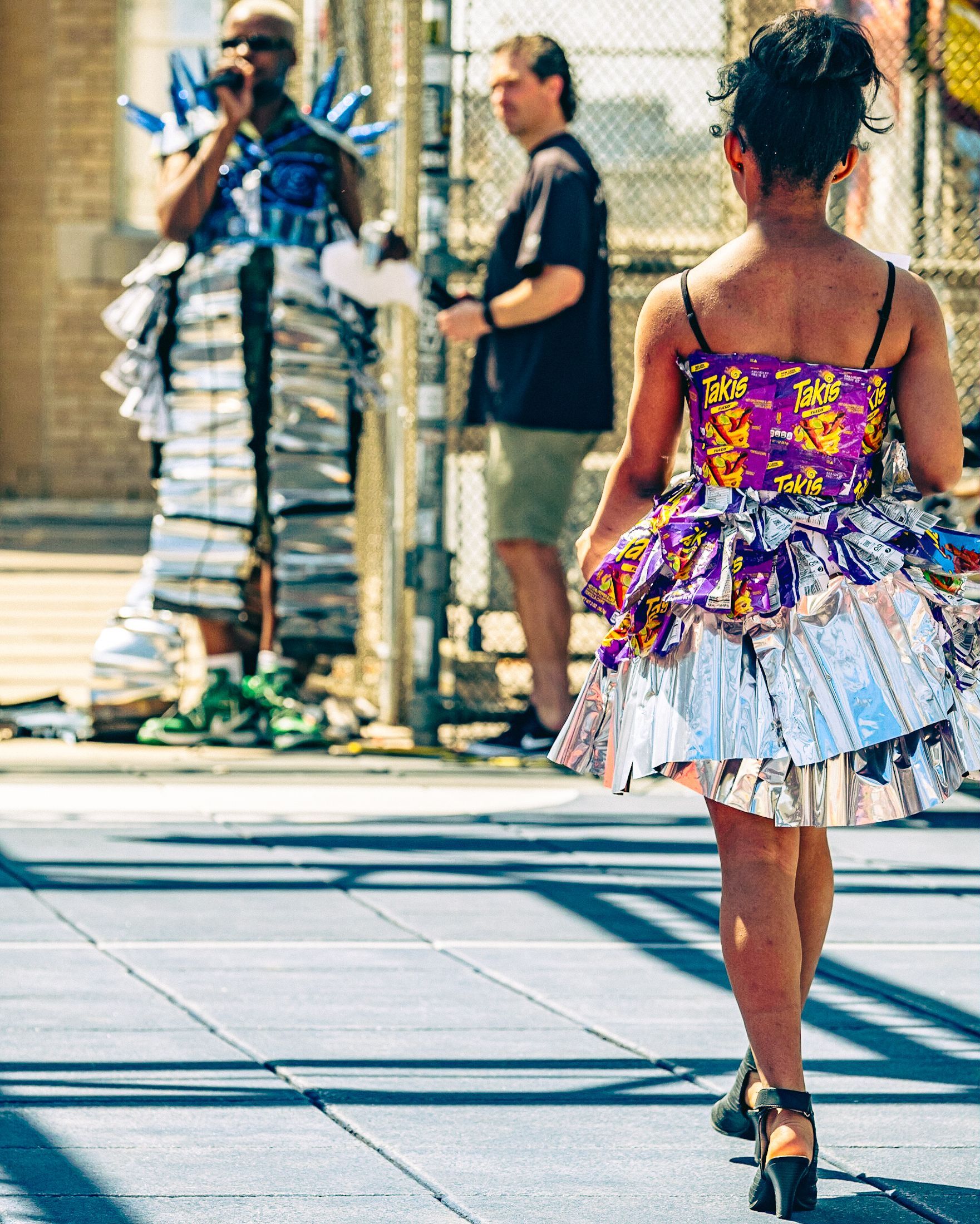 Model in hand-made garment at the 2023 Sustainable Fashion Show at New Design High School. Photo by Luis Suarez