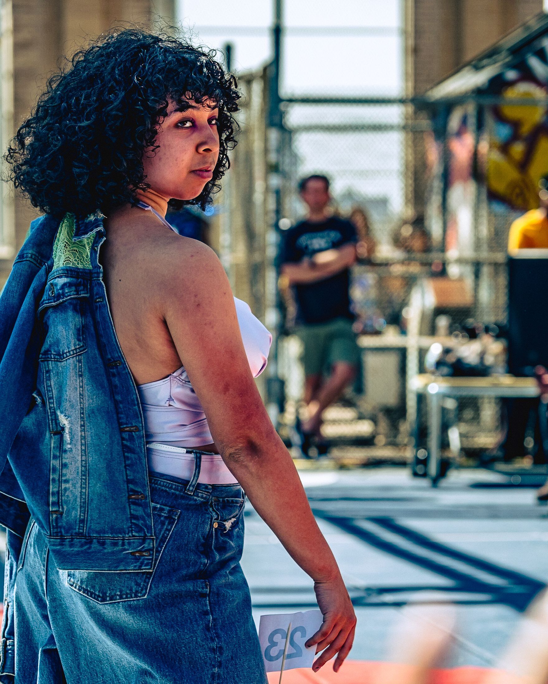 Model in hand-made garment at the 2023 Sustainable Fashion Show at New Design High School. Photo by Luis Suarez