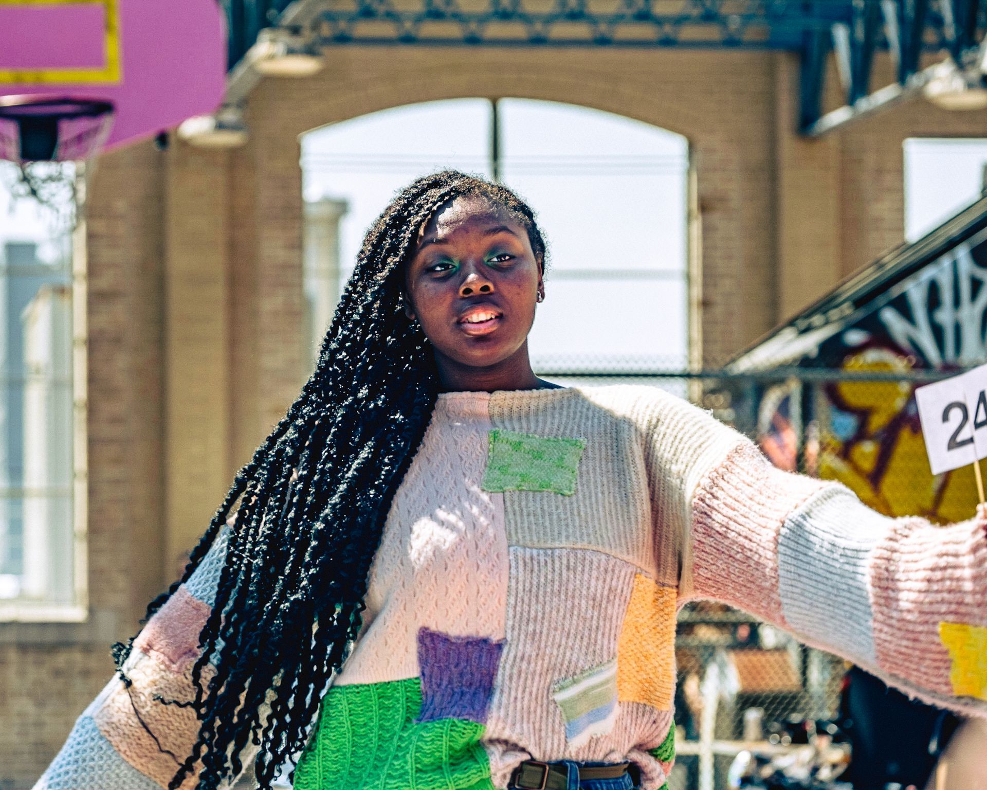 Model in hand-made garment at the 2023 Sustainable Fashion Show at New Design High School. Photo by Luis Suarez