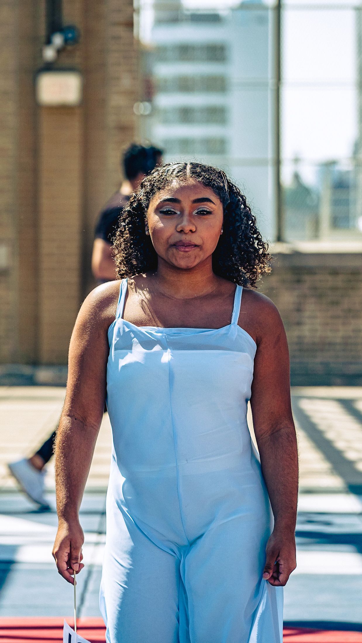Model in hand-made garment at the 2023 Sustainable Fashion Show at New Design High School. Photo by Luis Suarez