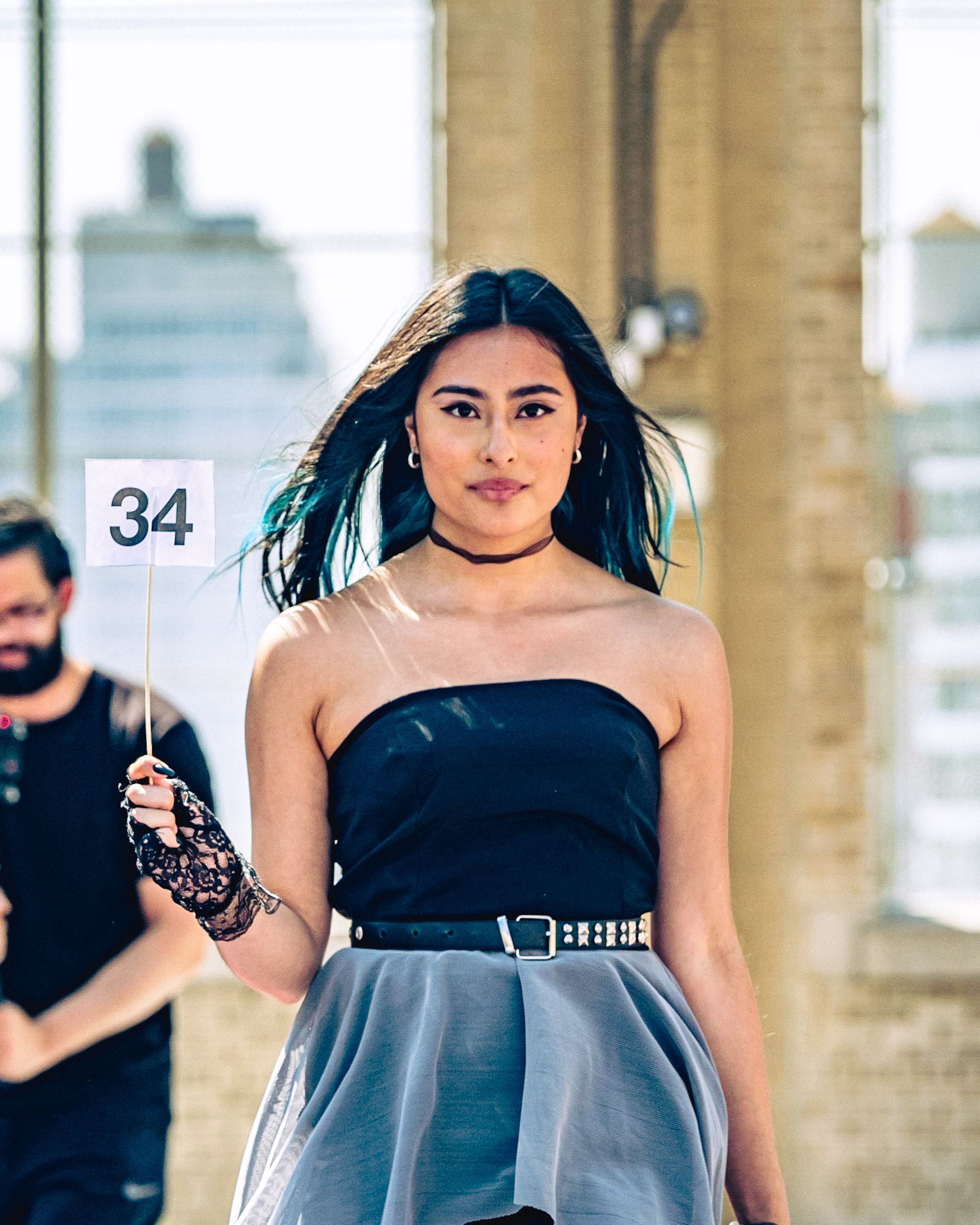Model in hand-made garment at the 2023 Sustainable Fashion Show at New Design High School. Photo by Luis Suarez
