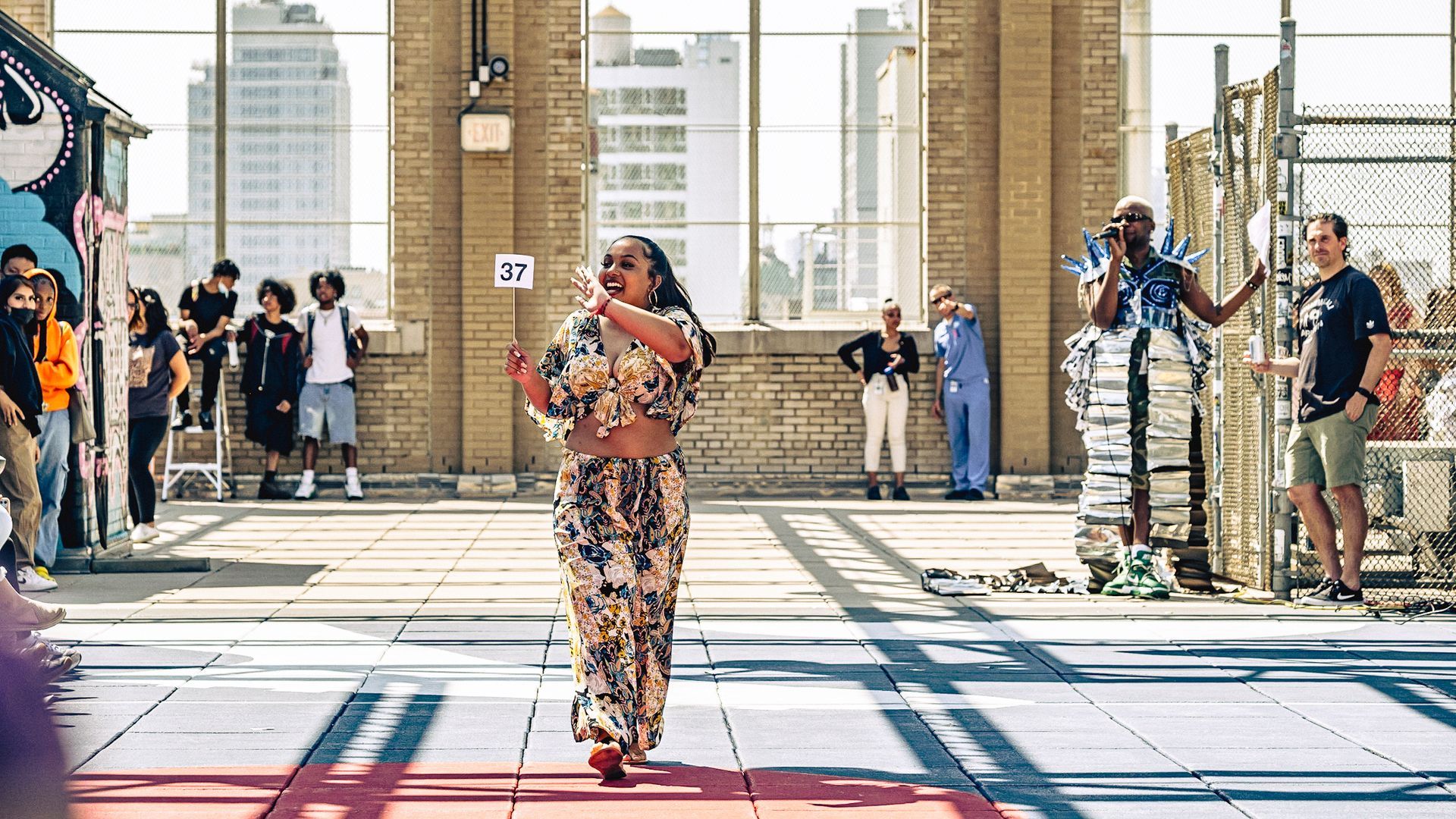Model in hand-made garment at the 2023 Sustainable Fashion Show at New Design High School. Photo by Luis Suarez