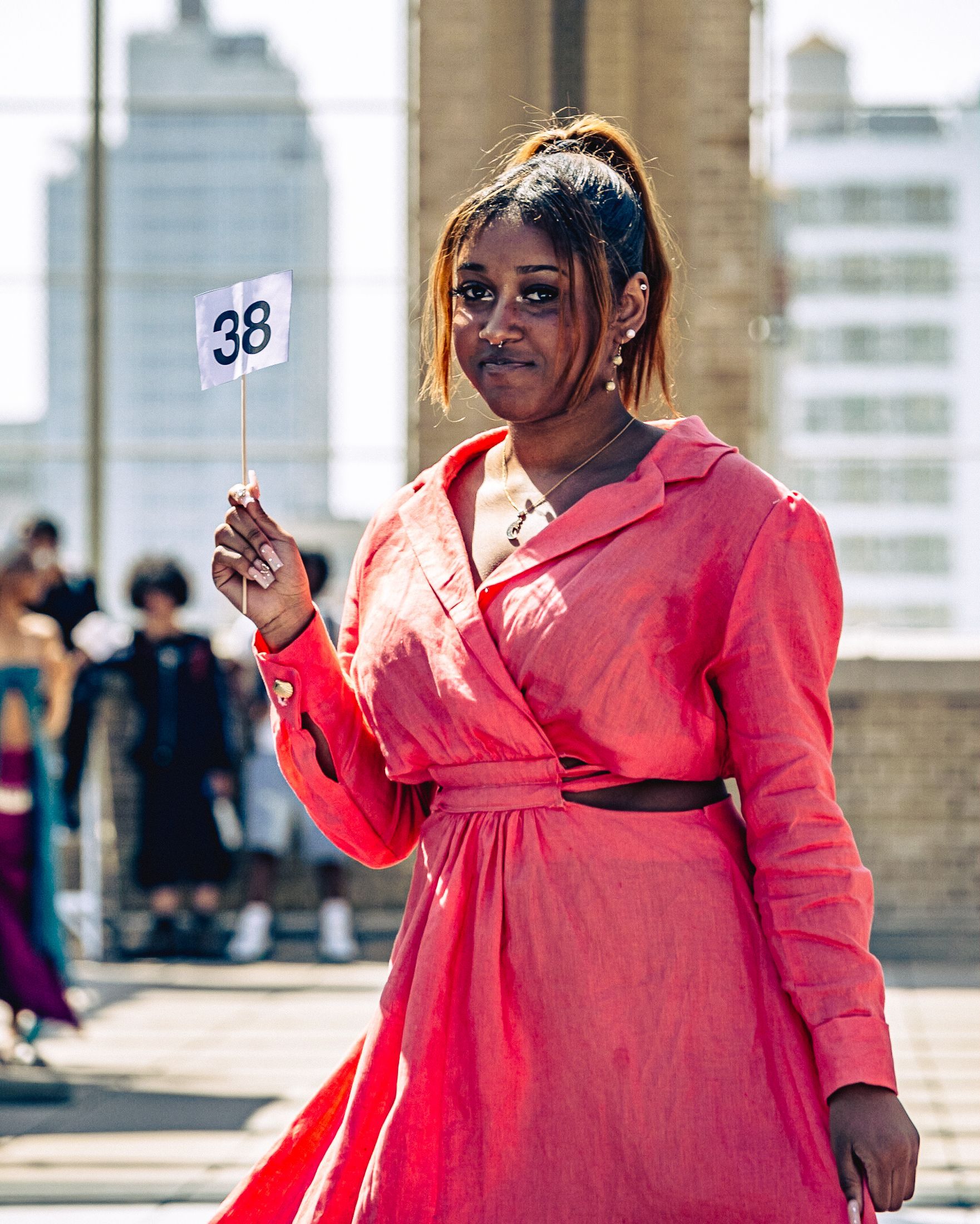 Student model walking runway on Seward Park Campus roof