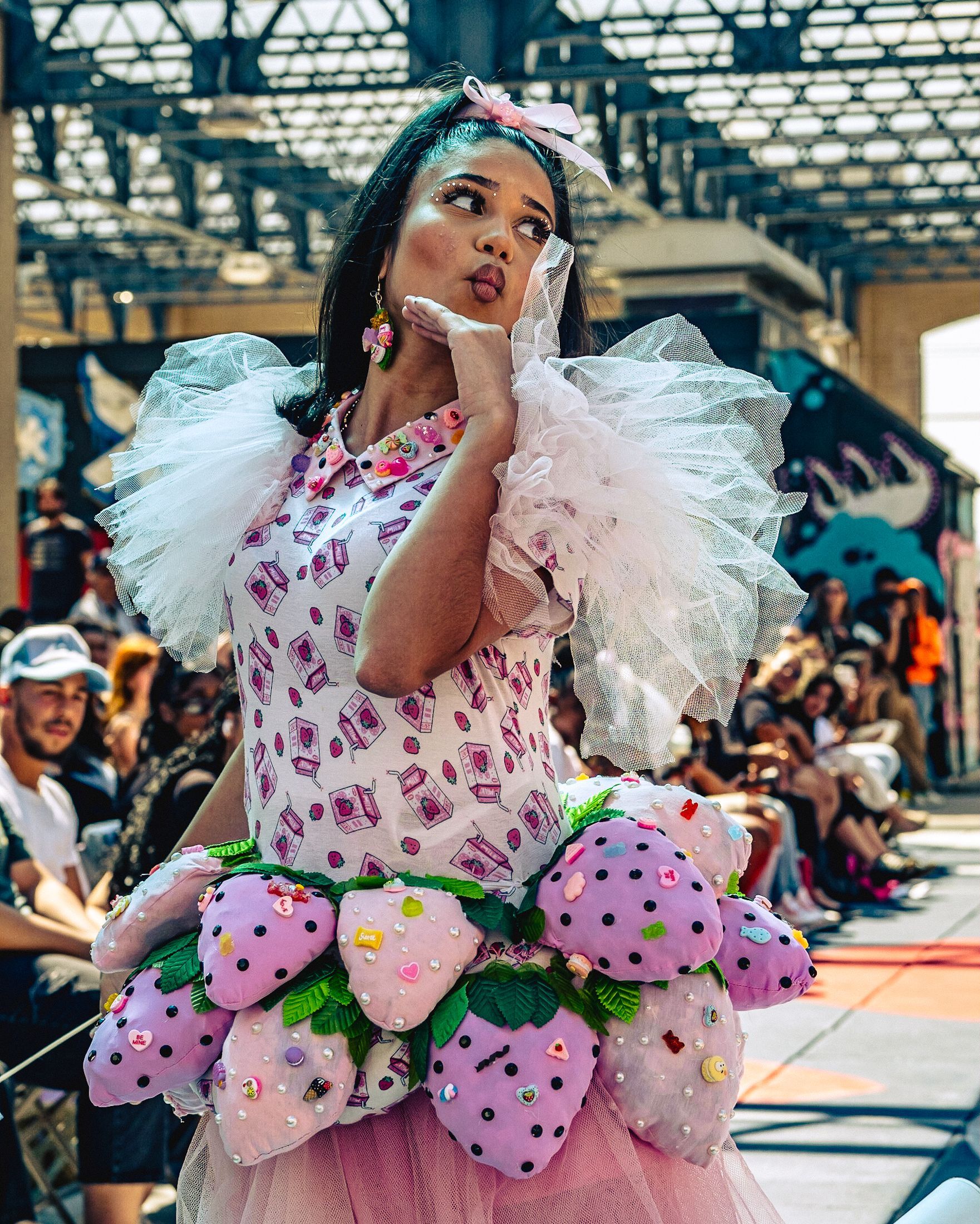 Model in hand-made garment at the 2023 Sustainable Fashion Show at New Design High School. Photo by Luis Suarez