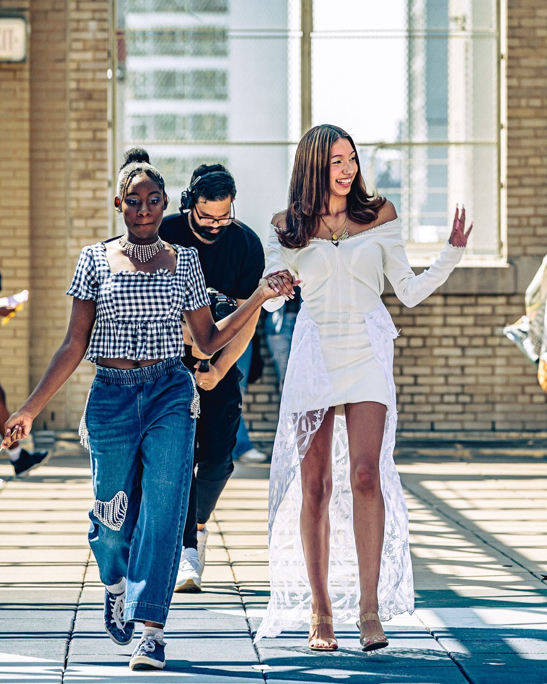 Model in hand-made garment at the 2023 Sustainable Fashion Show at New Design High School. Photo by Luis Suarez