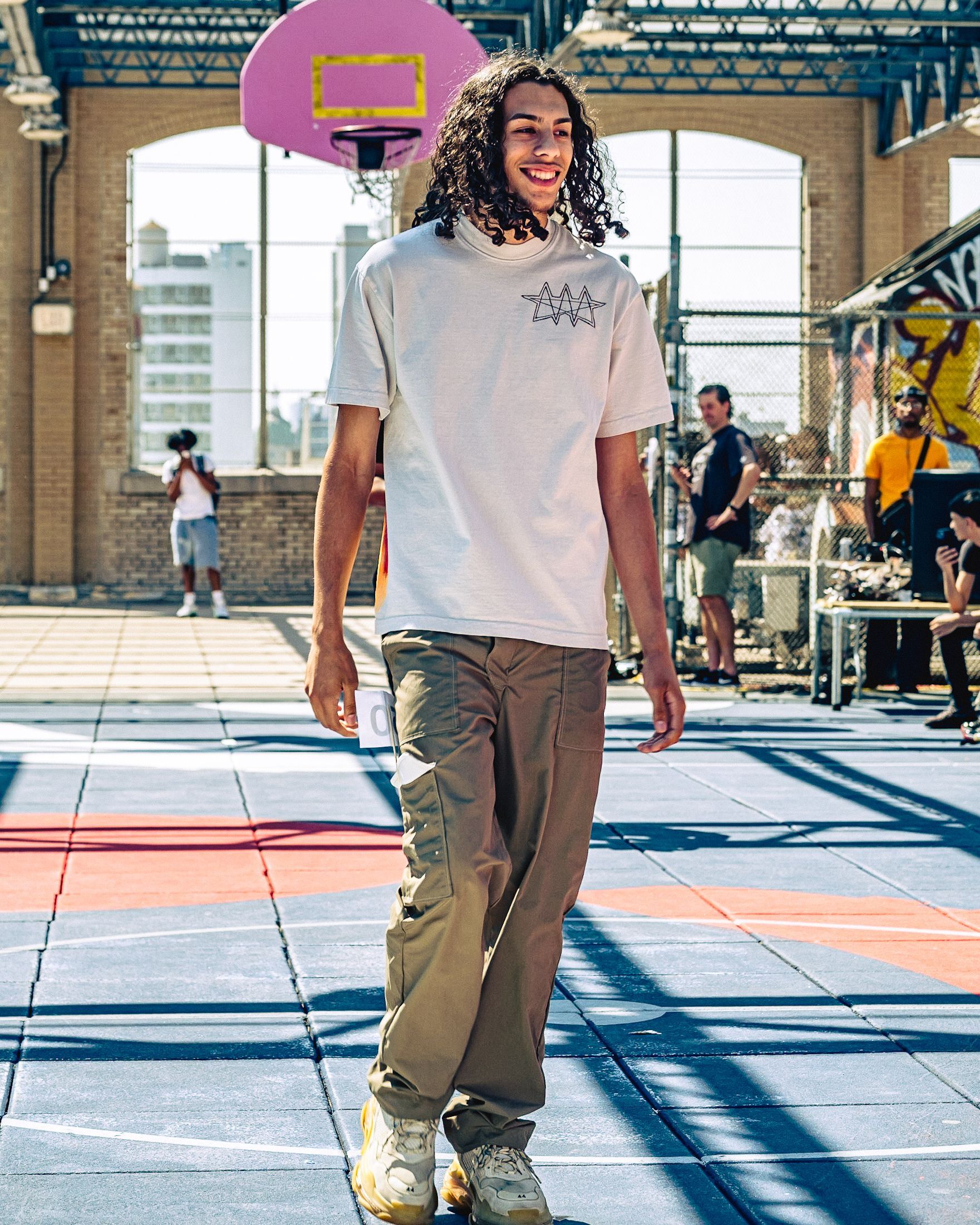 Model in hand-made garment at the 2023 Sustainable Fashion Show at New Design High School. Photo by Luis Suarez