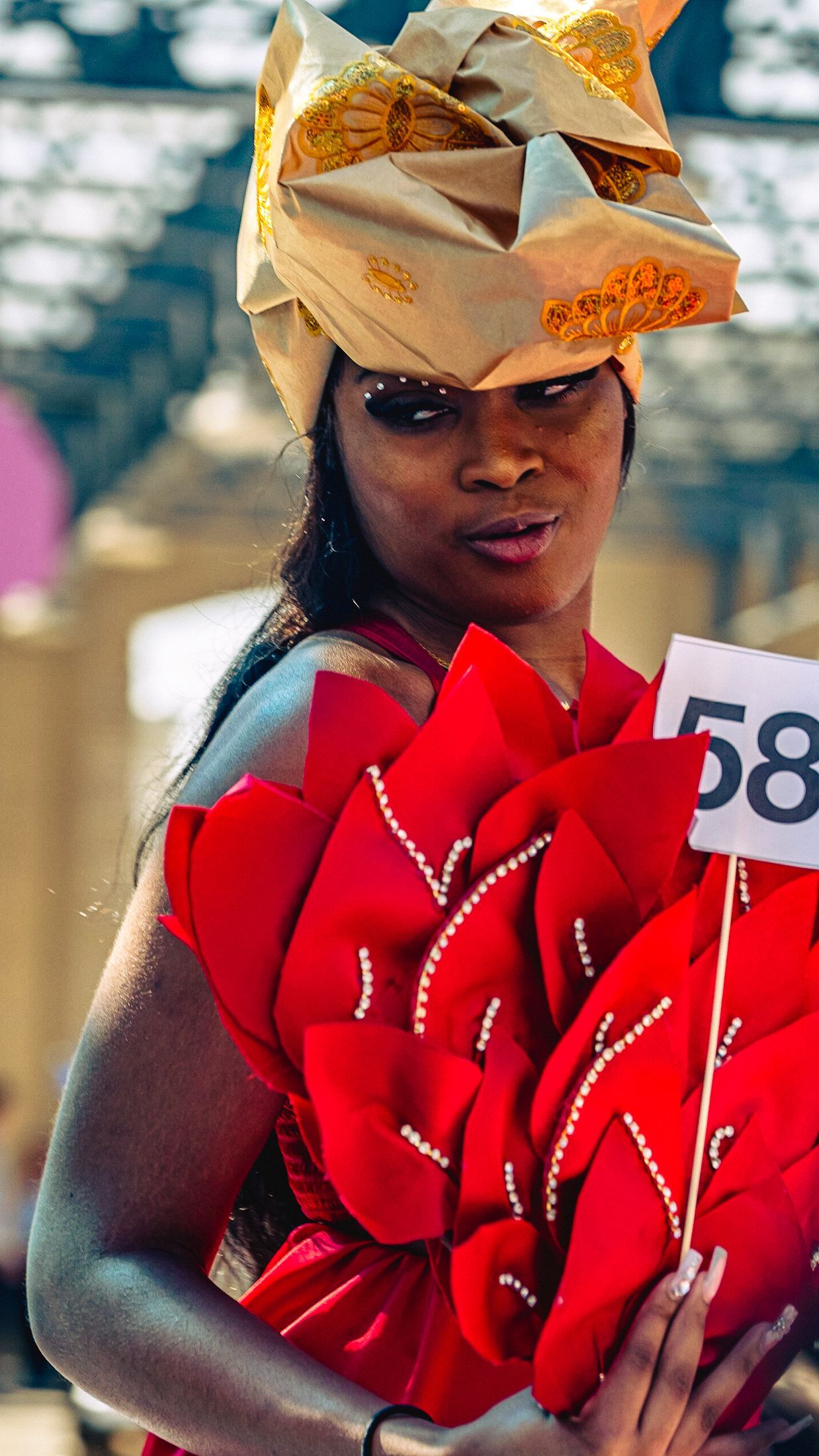 Model in hand-made garment at the 2023 Sustainable Fashion Show at New Design High School. Photo by Luis Suarez