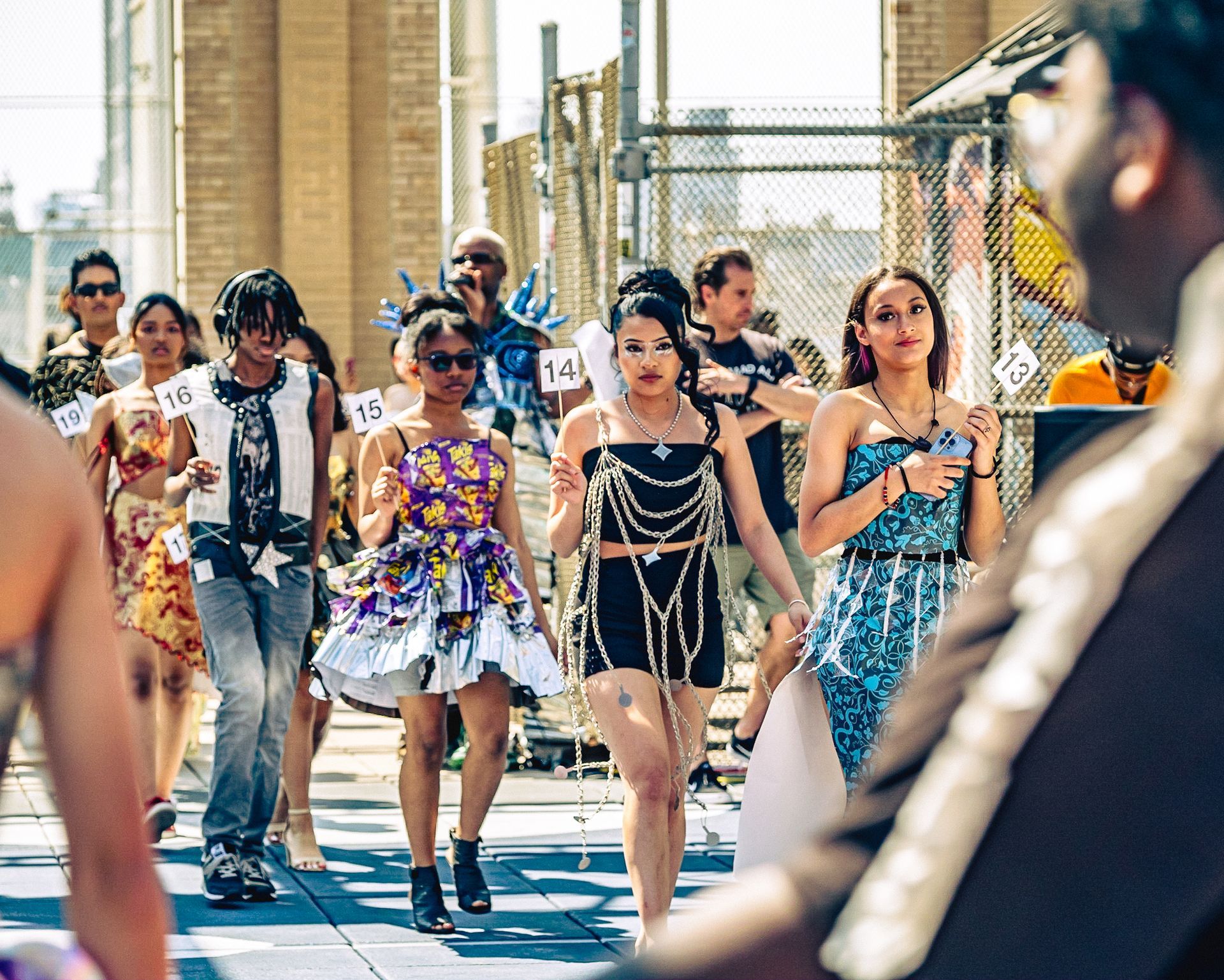 Model in hand-made garment at the 2023 Sustainable Fashion Show at New Design High School. Photo by Luis Suarez