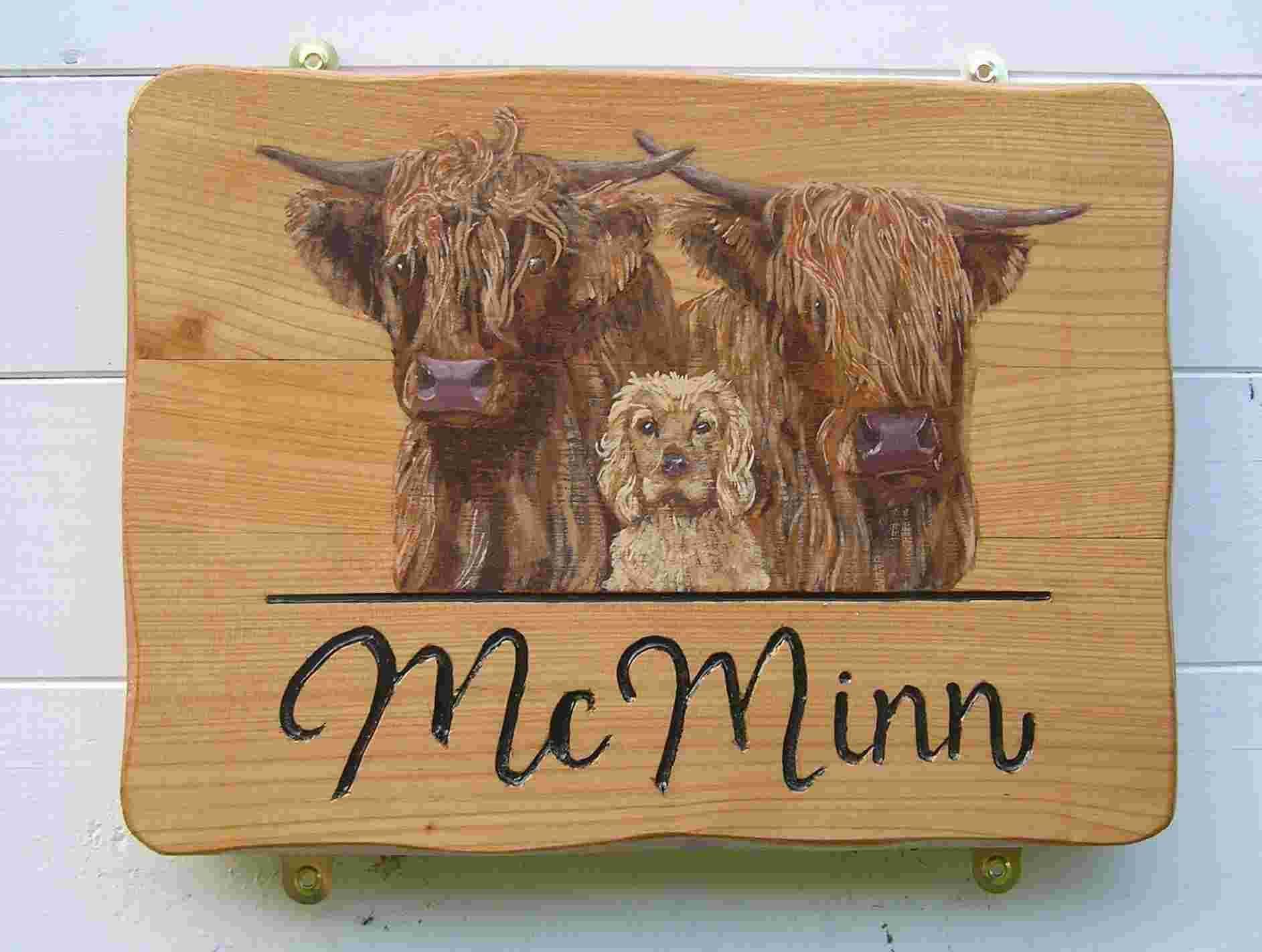 A handmade wooden house name plaque with highly accurate  hand painted animal and pet portraits by Ingrained Culture