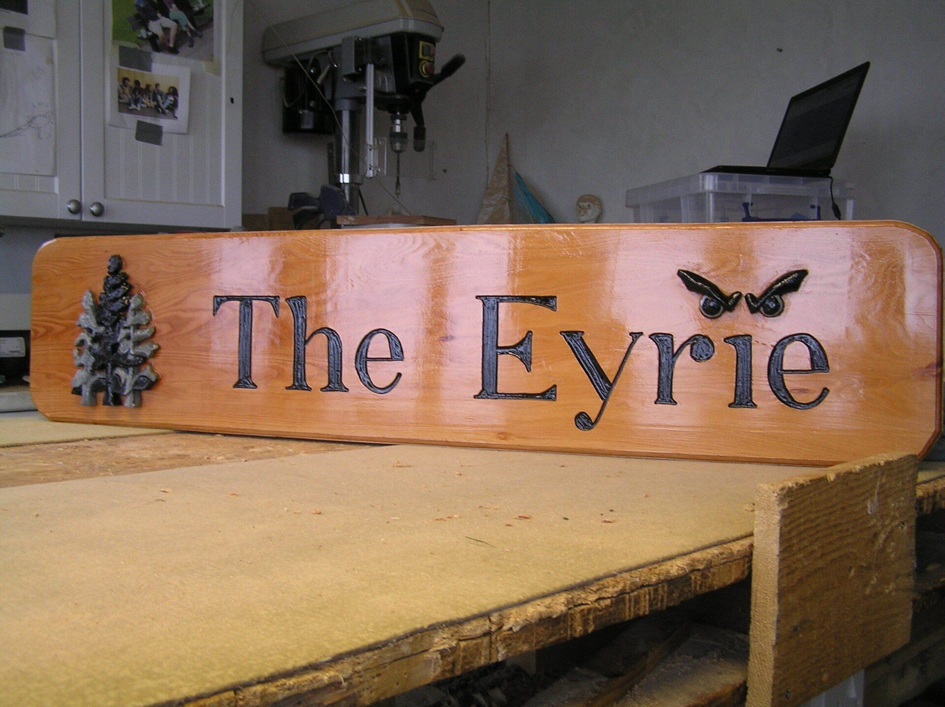 wooden house sign by Ingrained Culture