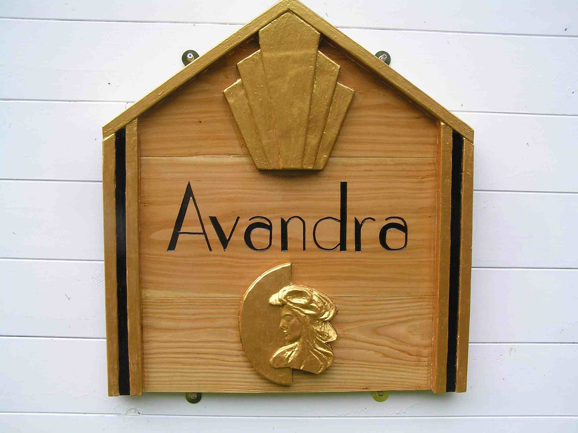 A personalised wooden Art Deco house sign for Avandra made by Ingrained Culture