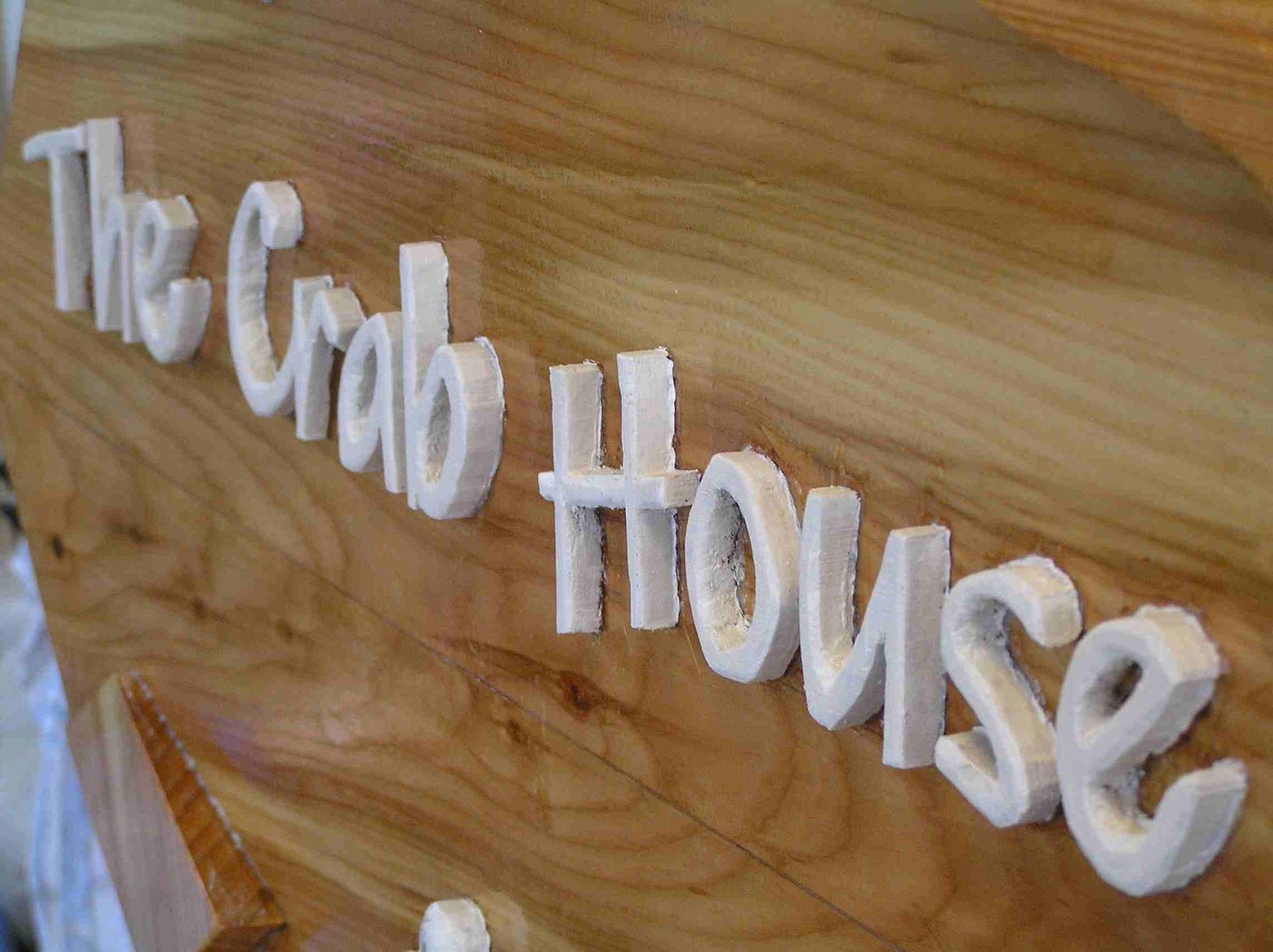 A house sign professionally designed by Ingrained Culture