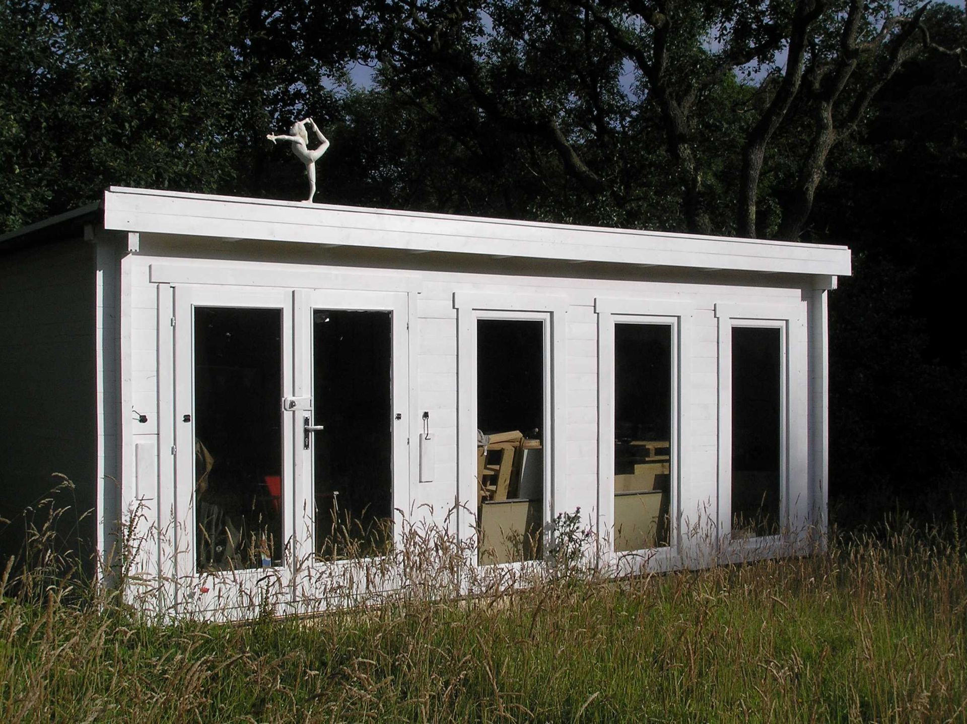 A contemporary architectural sculpture ornamenting a building. Made by Ingrained Culture