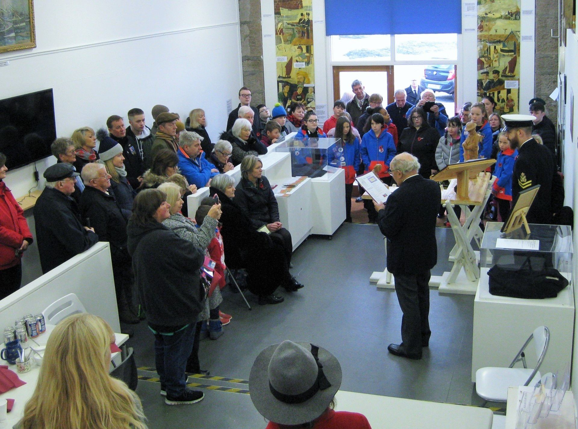 A group standing by the new centenary first world war memorial
