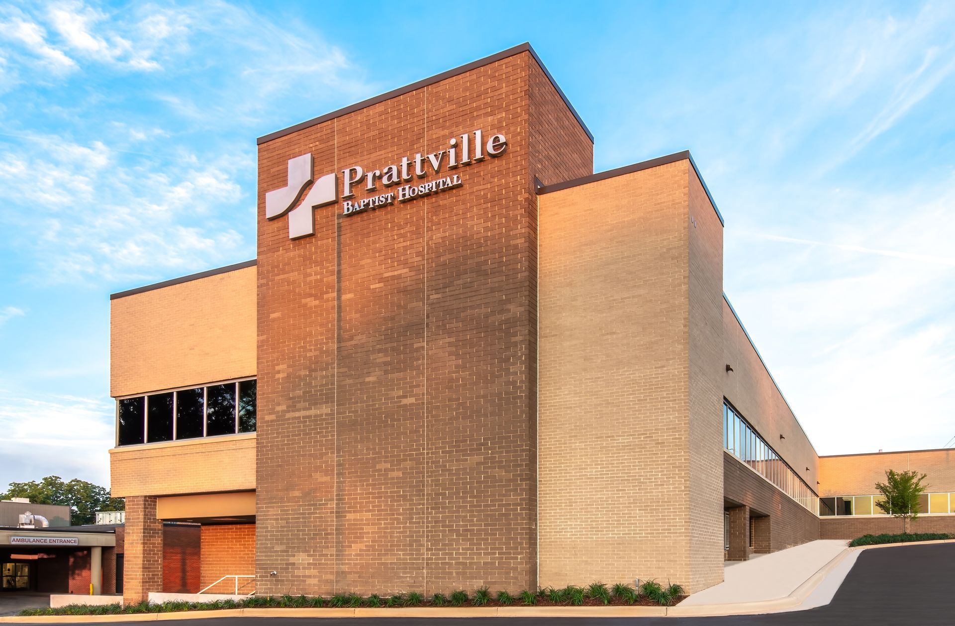 a large brick building with the word prattville on it