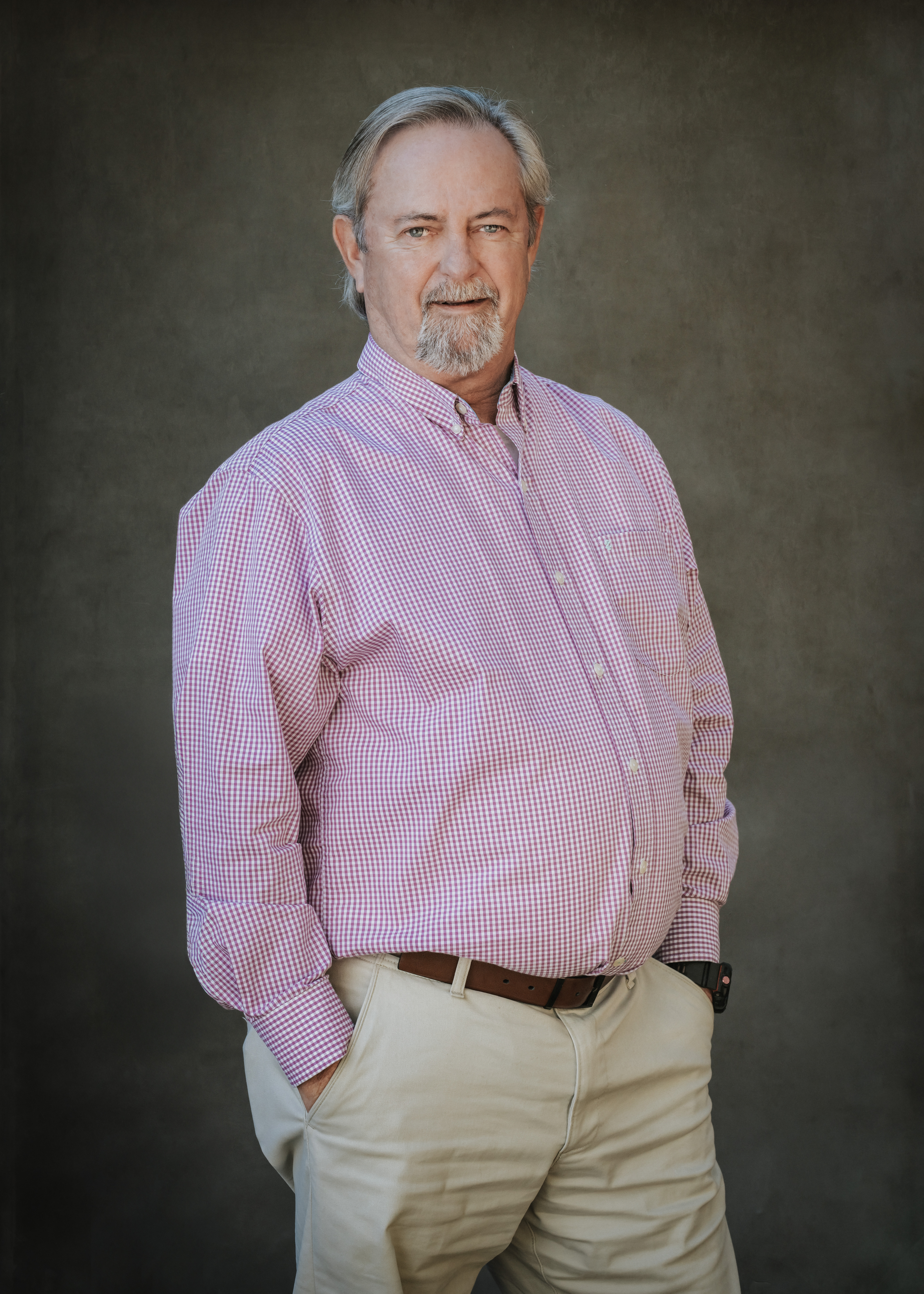Ralph Stephens wearing a green shirt and looking at the camera.