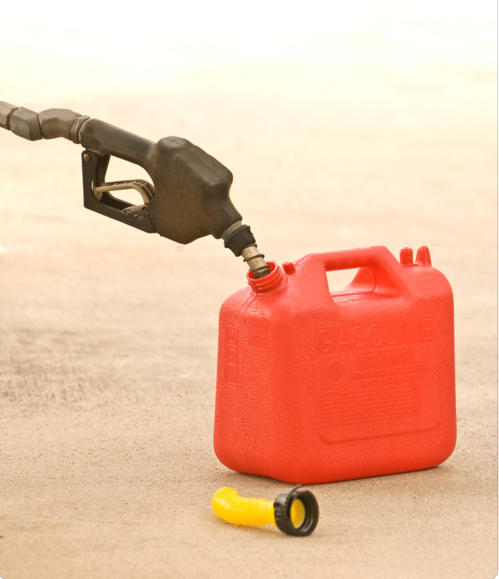 jerry can being filled up with gas