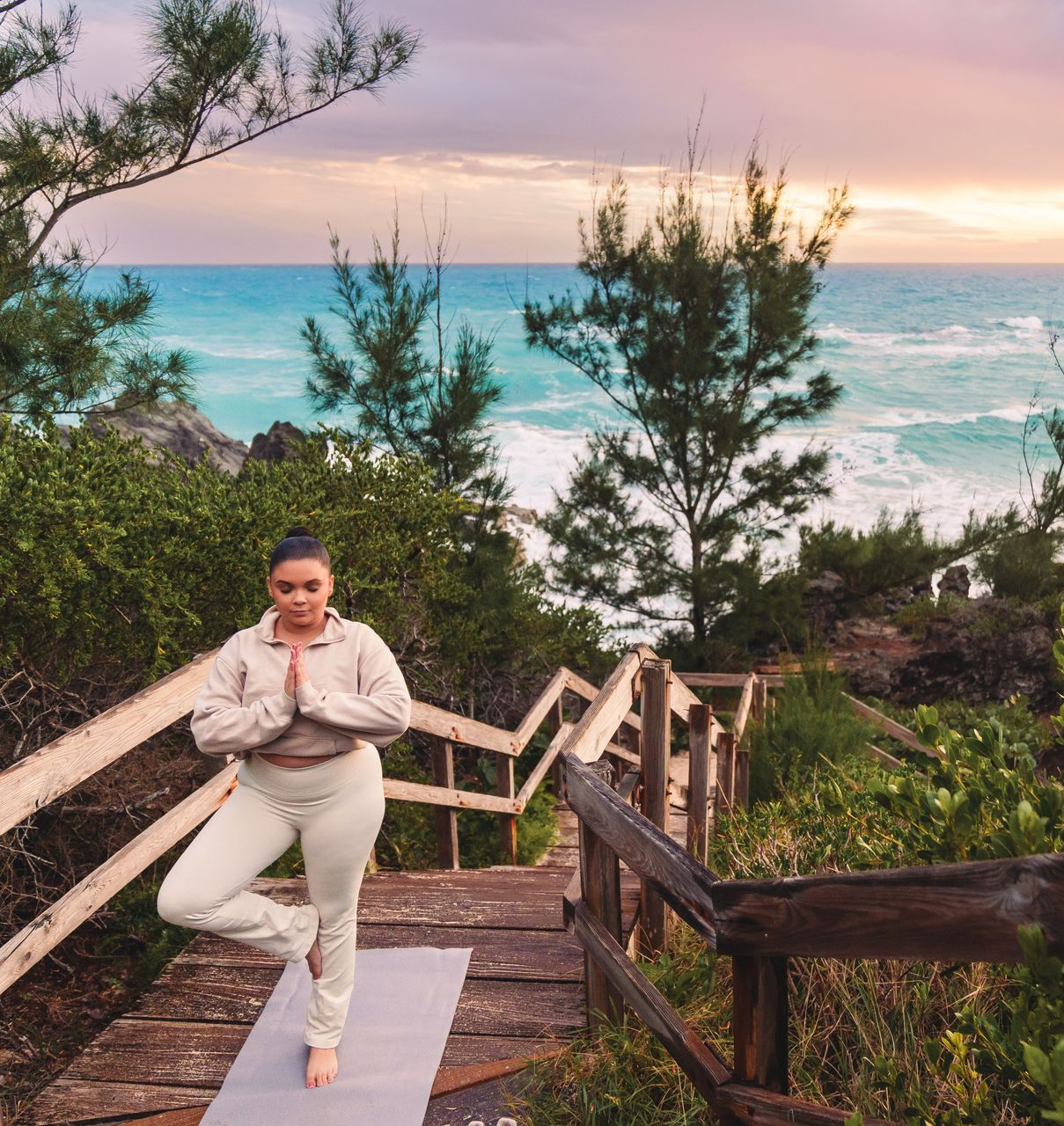 Bermuda coastal view with woman exploring near RV