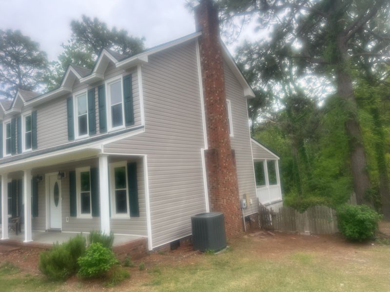 Beige vinyl siding remodeling services