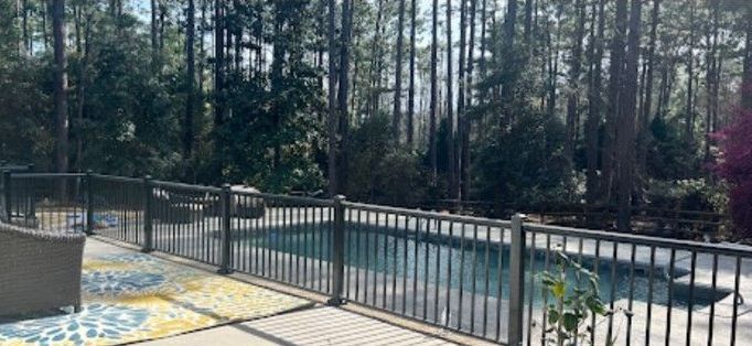 Finished inground rectangular pool with  rounded edges