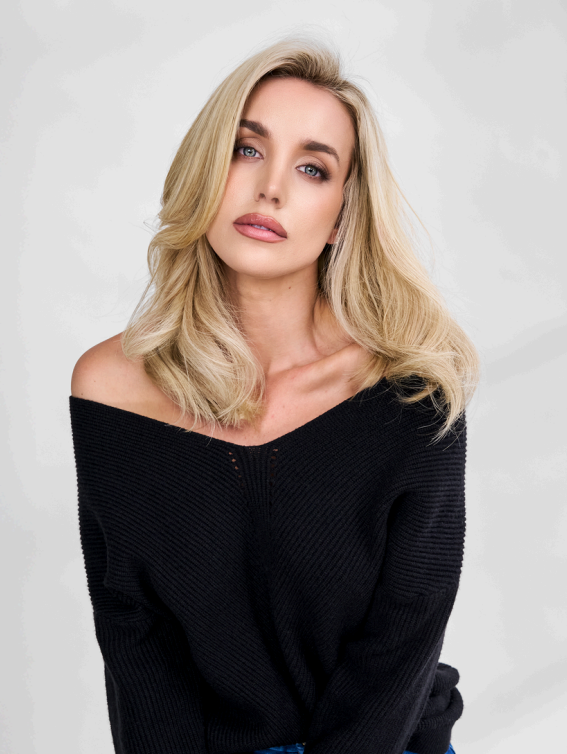 Hair extensions for blonde girl in a beauty salon. Hair extensions for blonde girl in a beauty salon.