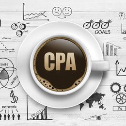 A cup of coffee with the word cpa on it