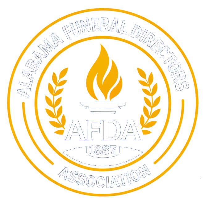 White and gold Alabama Funeral Directors Association seal with torch, laurel wreath, and AFDA 1957 text