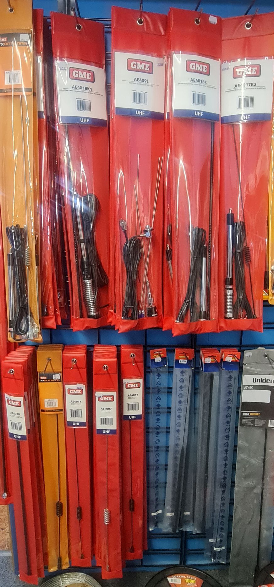 Tools in Red Packaging on a Store Shelf, With a Blue Background — Central Western Communications in Emerald, QLD