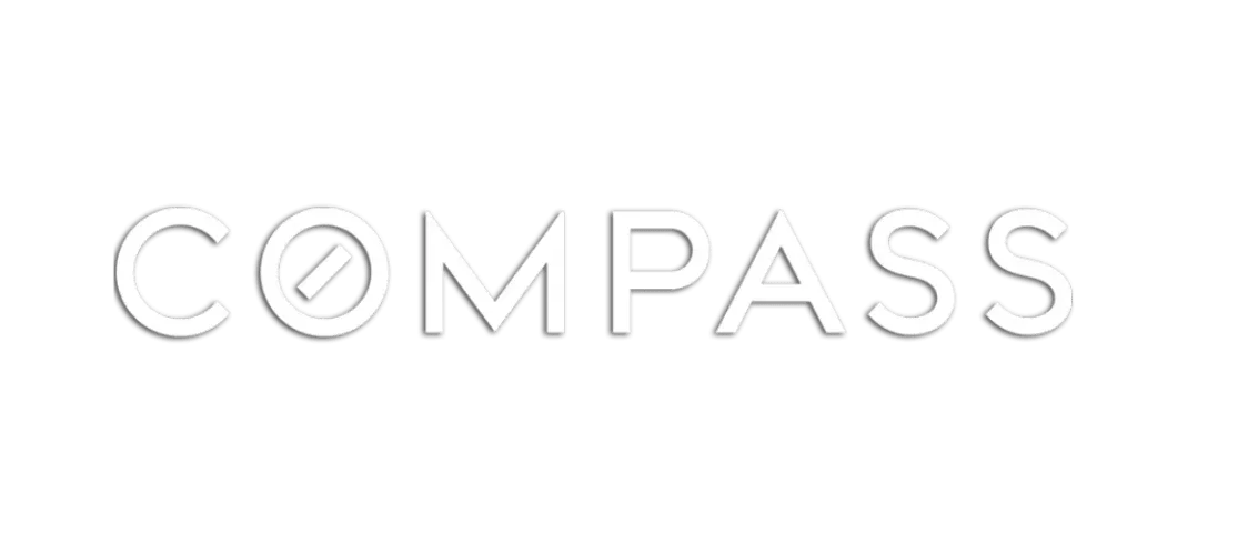 The word compass is written in black on a white background.