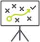 An icon of a whiteboard with a green arrow pointing to a check mark.