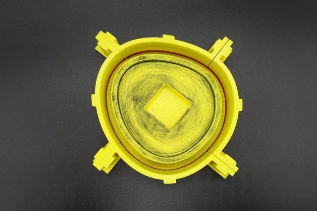 Yellow 3D printed mould part