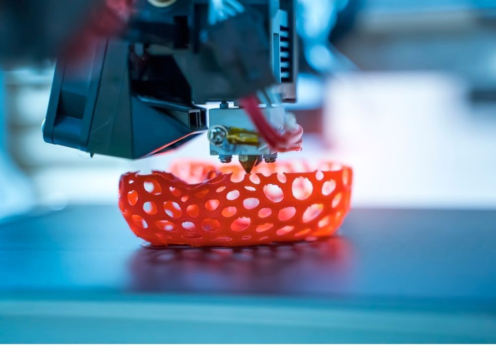 a plastic prototype being 3D printed