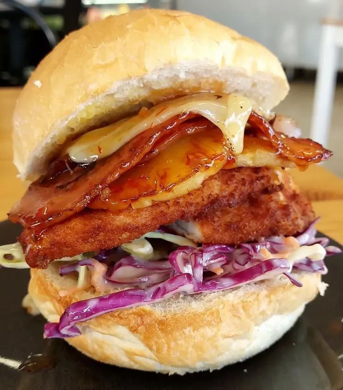 A Close Up of a Chicken Sandwich With Coleslaw and Bacon — Coffee on High in Wauchope, NSW