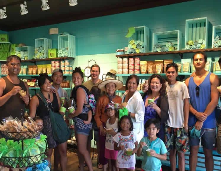 A group of people are posing for a picture in a store.