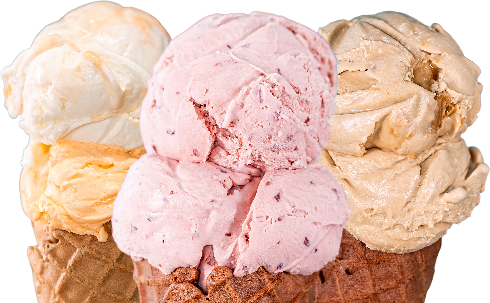 Three different flavors of ice cream are in a waffle cone.