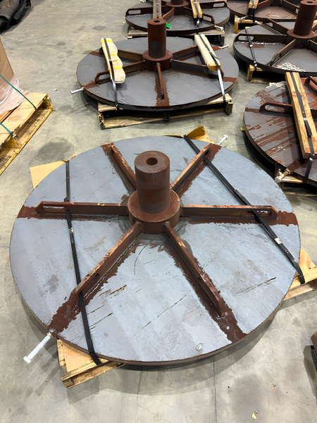 Ball mill head and trunnion assembly with welded stiffening ribs and gussets